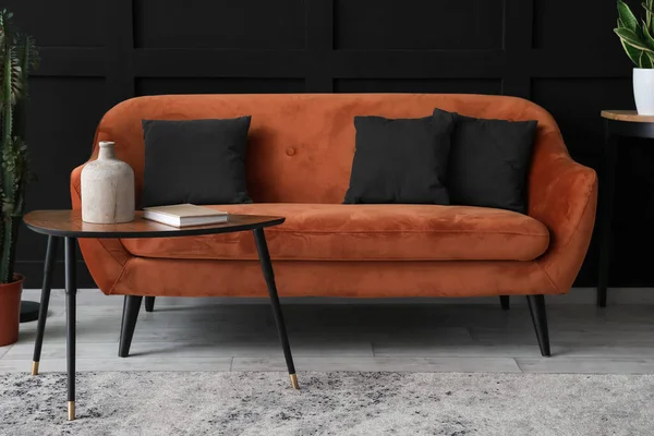 Cozy Sofa Pillows Table Black Wall Living Room — Photo