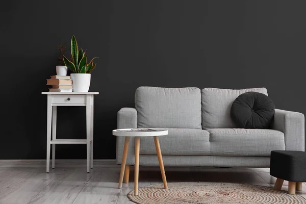 Interior Living Room Grey Sofa Table Pouf Black Wall — Photo