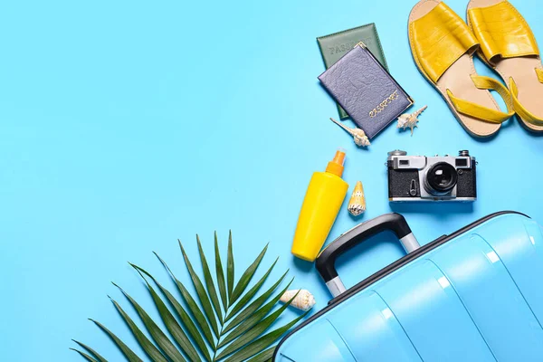 Traveler Accessories Suitcase Palm Leaf Blue Background —  Fotos de Stock