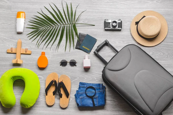 Accessories Travelling Suitcase Grey Wooden Background —  Fotos de Stock