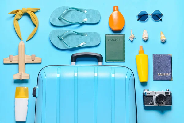 Different Accessories Vacation Suitcase Blue Background —  Fotos de Stock