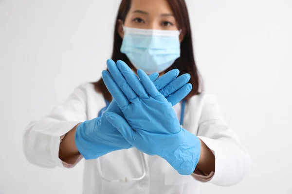 Female Asian Doctor Showing Stop Gesture White Background — Stockfoto