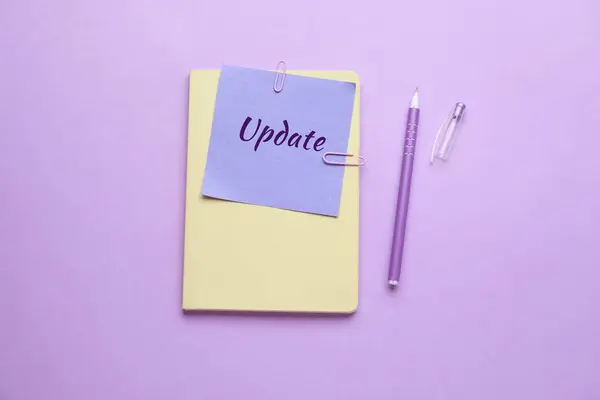 Notebook Pen Note Paper Text Update Lilac Background — Stock Photo, Image