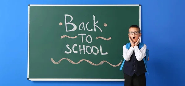 Surprised Boy Blackboard Text Back School Blue Background — Foto de Stock