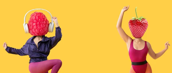 Women Ripe Berries Instead Heads Doing Aerobics Yellow Background — Stock Photo, Image