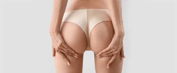 Fesses Jeune Femme Sous Vêtements Sur Fond Clair — Photo