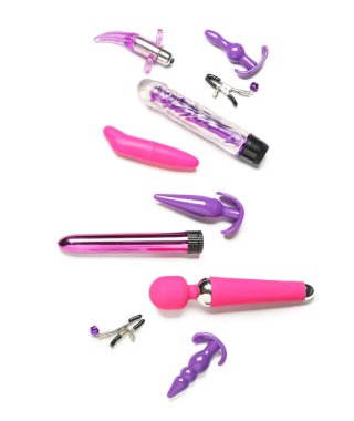 Beyaz arka planda seks dükkanından farklı oyuncaklar