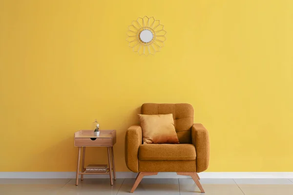 Soft Armchair Wooden Table Yellow Wall — Stock Photo, Image