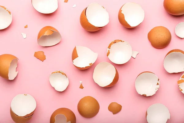 Many Broken Egg Shells Pink Background — Photo
