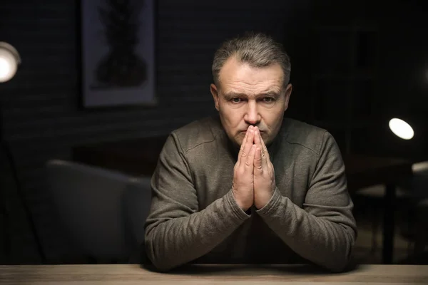 Praying Mature Man Dark Room — Stock Fotó