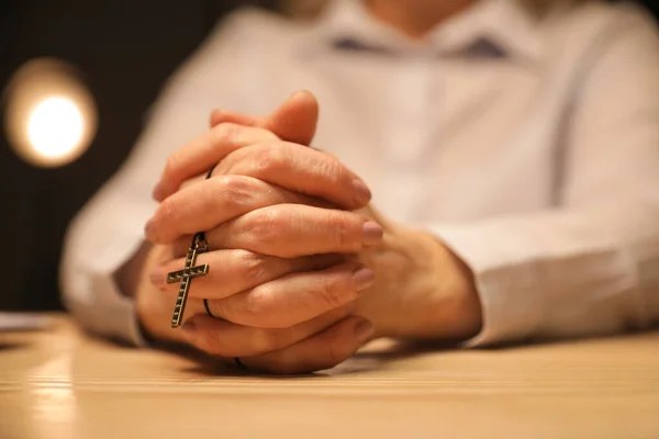 Praying Mature Woman Cross Sitting Table Closeup — Stockfoto