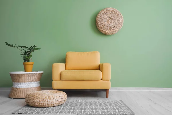 Comfortable Armchair Pouf Table Houseplant Green Wall Room — Stockfoto