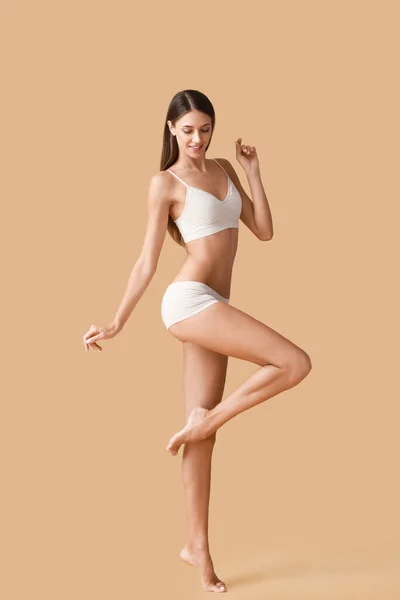 Young Tanned Woman Underwear Beige Background — Foto de Stock
