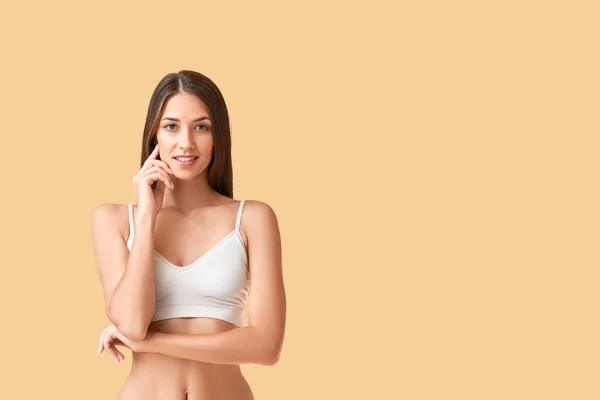 Young Tanned Woman Beige Background — Foto de Stock