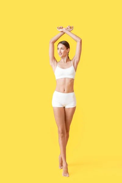 Young Tanned Woman Underwear Yellow Background — Photo