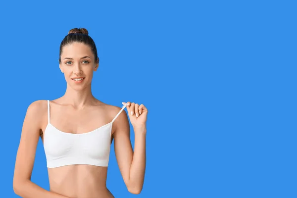 Young Tanned Woman Underwear Blue Background — Stockfoto