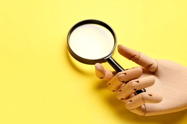 Wooden Hand Magnifying Glass Yellow Background — ストック写真