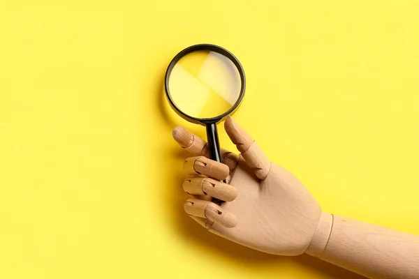 Wooden Hand Magnifying Glass Yellow Background — Fotografia de Stock