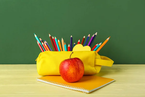 Pencil Case Apple Notebook Table Green Background — 스톡 사진