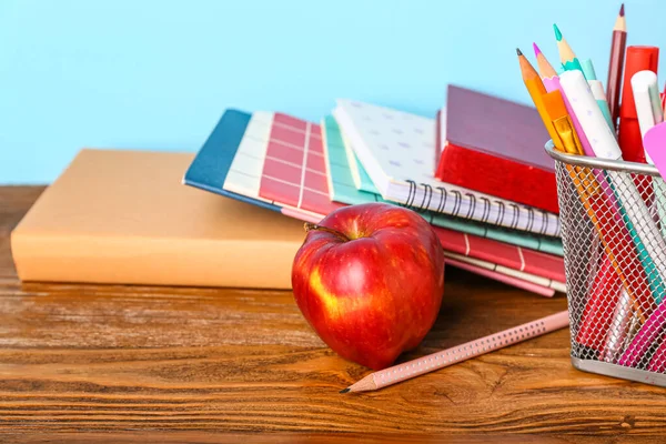 School Stationery Apple Table Blue Background — Stock Fotó