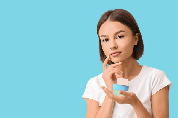 Pretty Young Woman Makeup Sponges Blue Background — Stock Photo, Image