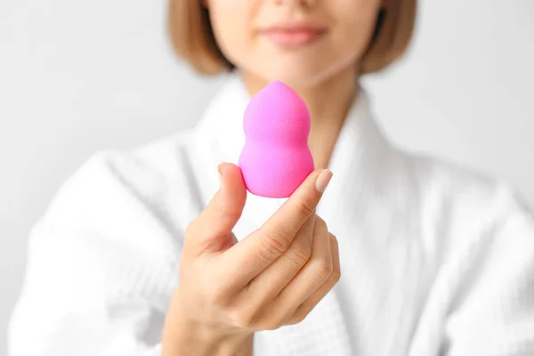 Young Woman Pink Makeup Sponge Grey Background Closeup — Fotografie, imagine de stoc