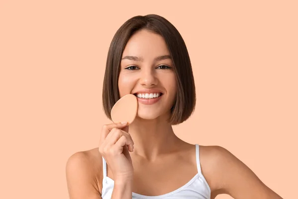 Pretty Young Woman Makeup Sponge Beige Background — 图库照片