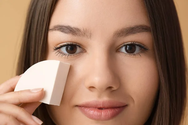Pretty Young Woman Makeup Sponge Beige Background Closeup — 스톡 사진