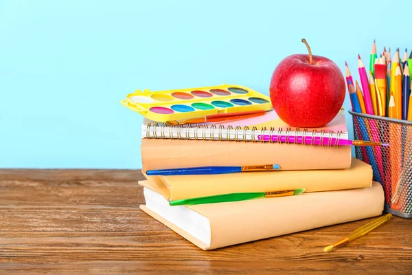 School Stationery Apple Paints Table Blue Background — Stock Photo, Image