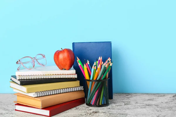 School Stationery Apple Eyeglasses Table Blue Background — Stock Fotó