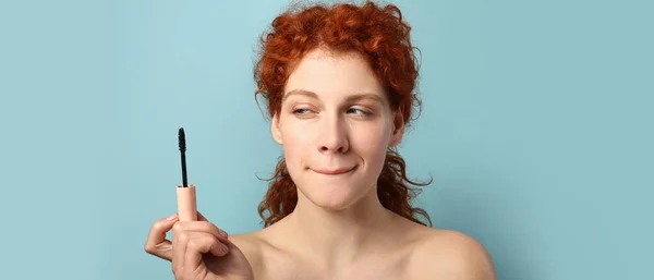 Beautiful Redhead Woman Mascara Blue Background — Foto de Stock