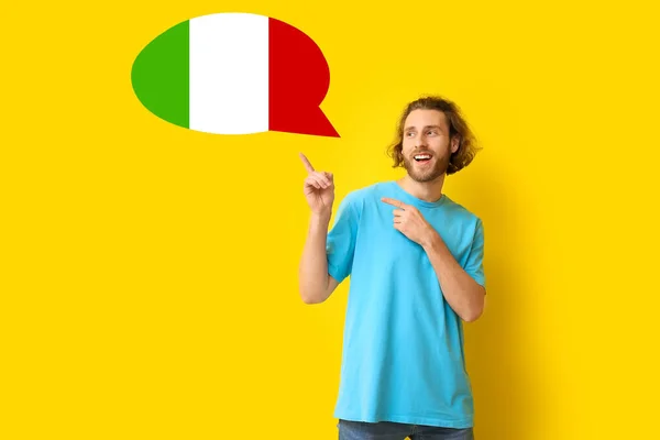 Young Man Pointing Speech Bubble Yellow Background Studying Italian Language — ストック写真