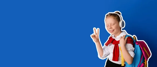 Cute Little Schoolgirl Listening Music Showing Victory Gesture Blue Background — Foto Stock