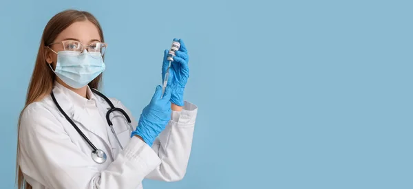 Female Doctor Holding Monkeypox Vaccine Syringe Blue Background Space Text — Stockfoto