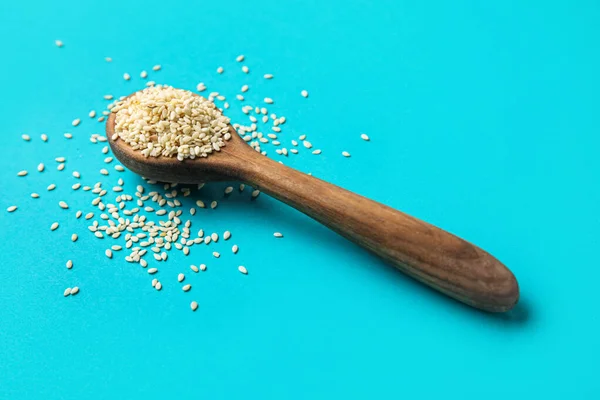 Spoon Sesame Seeds Blue Background — Stock Photo, Image