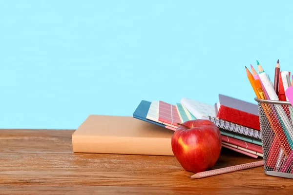 School Stationery Apple Table Blue Background — Stock Fotó
