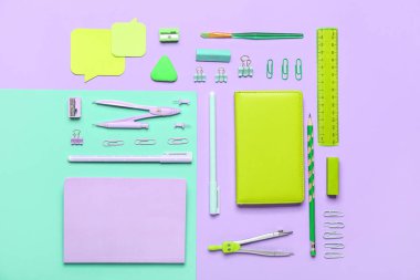 School stationery on blue and lilac background