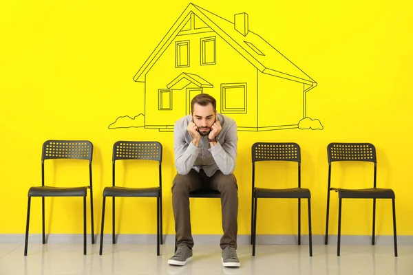 Young Man Dreaming His New House Yellow Wall Room —  Fotos de Stock