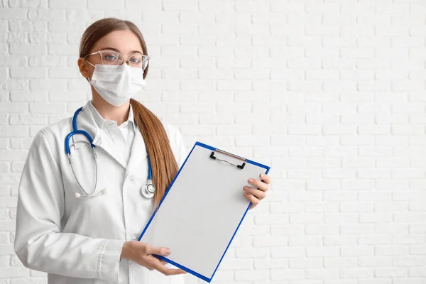 Female Doctor Blank Clipboard White Background — Stockfoto