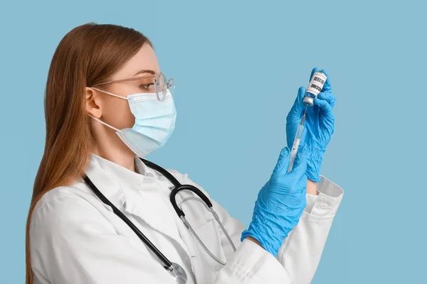 Female Doctor Monkeypox Vaccine Syringe Blue Background — Stockfoto
