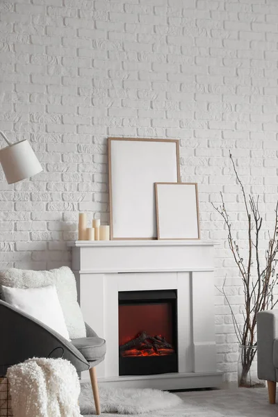 Electric Fireplace Blank Frames Candles White Brick Wall Living Room — Stockfoto