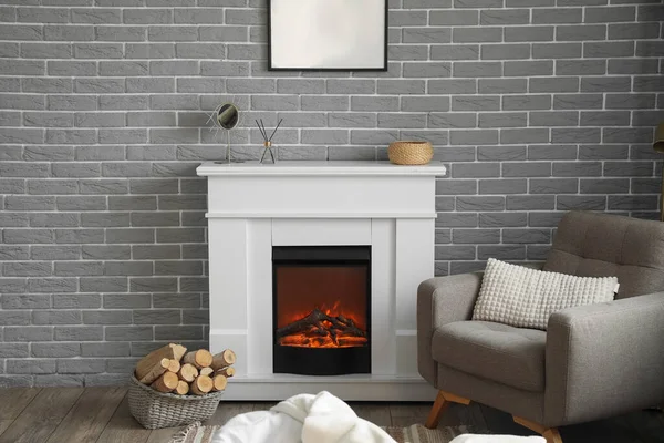 Electric Fireplace Mirror Reed Diffuser Grey Brick Wall Bedroom — ストック写真