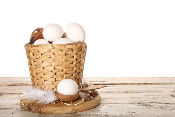 Board Wicker Basket Chicken Eggs Feathers Wooden Background White Background — Fotografia de Stock