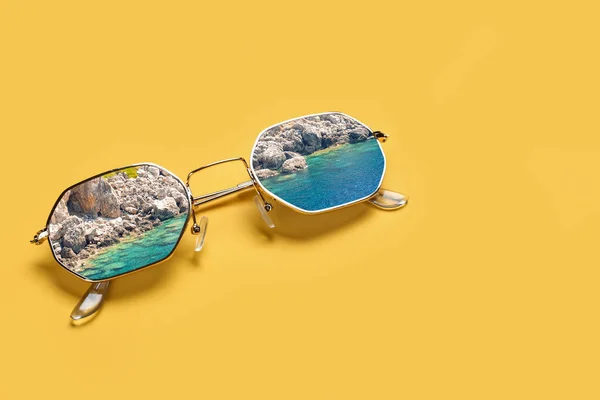 Stylish Sunglasses Reflection Sea Mountains Yellow Background — 스톡 사진