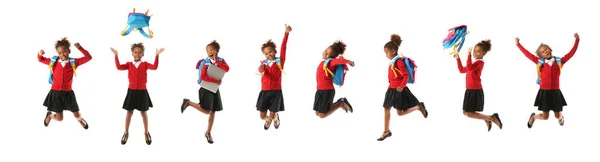 Set Jumping Little African American Schoolgirl White Background — 图库照片