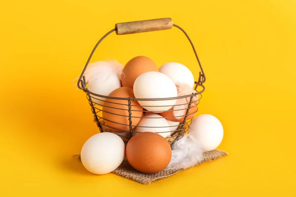 Basket Chicken Eggs Feathers Color Background — Φωτογραφία Αρχείου
