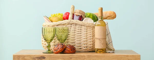 Basket Tasty Food Wine Picnic Table Light Background — Stock Photo, Image