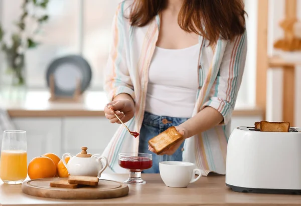 Beautiful Young Woman Making Tasty Toasts Kitchen — Stok fotoğraf