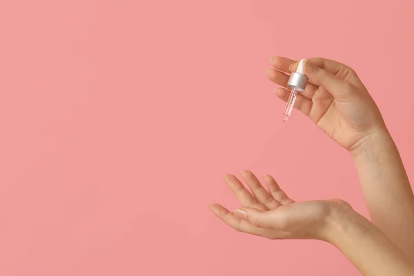 Hands Young Woman Cosmetic Serum Pink Background — Stock Photo, Image