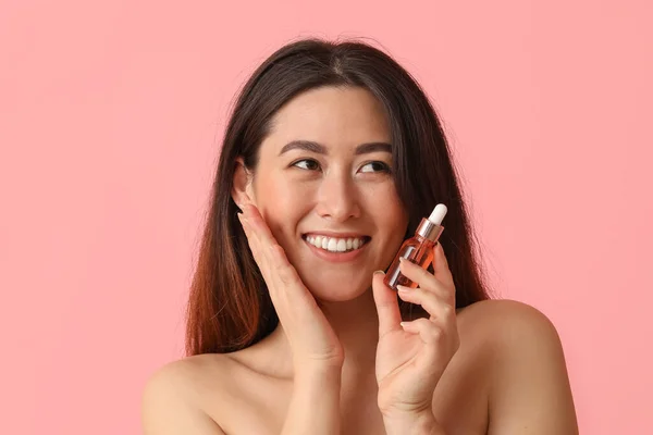 Young Asian Woman Cosmetic Serum Pink Background — Stock Photo, Image